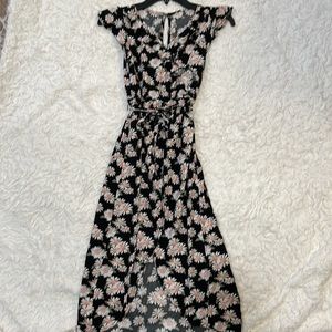 Girls romper, skort. Sz large. Excellent condition. Black with flowers.